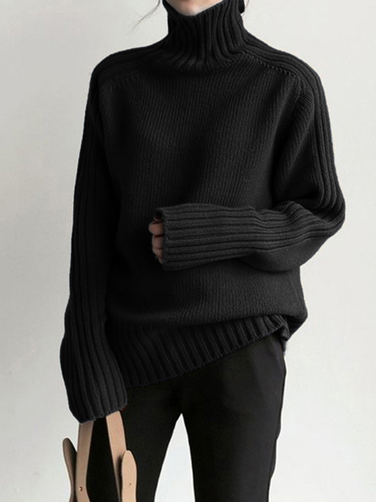 Bianca – Maglione a collo alto in maglia tinta unita
