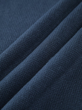 Bianca – Maglione a collo alto in maglia tinta unita